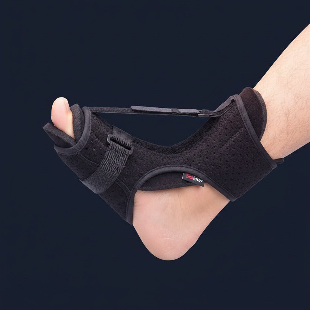 SOLEUS Night Splint — v1 on-foot lateral studio (midnight-navy variant)