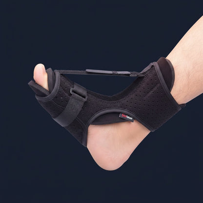 SOLEUS Night Splint — v1 on-foot lateral studio (midnight-navy variant)